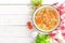 Vegetable soup. Healthy food, vegetarian dish. Vegetable soup with cabbage, potato, tomato, carrot, celery, pepper and green peas.