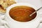 Vegetable soup in white ceramic bowl, food scene