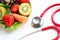 Vegetable and stethoscope, Healthy food and cholesterol diet.