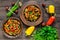 Vegetable stew salad: bell pepper, eggplant, asparagus beans, garlic, carrot, leek.