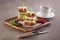 Vegetable toast on wooden tray with coffee and lettuce