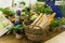 Vegetables and baguettes on a stylized counter