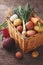 Vegetables in a basket: beets, onions, garlic, dill, potatoes, carrots