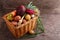 Vegetables in a basket: beets, onions, garlic, dill, potatoes, carrots