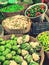 Vegetables Cabbage, cauliflower, greenchillies, capsicum, brinjal, bitterguard, raddish vegetables in basket at market in India