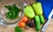 Vegetables are close-up on the cutting Board. Ripe tomatoes, cucumbers, bell peppers, curly parsley, garlic are prepared for a