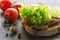 Vegetables. Close-up of lettuce, tomatoes, bread, roast beef, garlic and spices