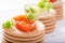 Vegetables on crackers: tomatoes, cheese and greens of parsley