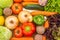 Vegetables on the dark background. Organic foods and fresh vegetables. Cucumber, cabbage,  salad, pepper,onion, garlic, carrot,
