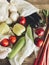 Vegetables in eco cotton bags on table in the kitchen, zero wast