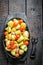 Vegetables with fresh tomato and garlic ready for grilling