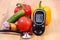 Vegetables, glucometer and stethoscope on wooden surface, healthy lifestyle, nutrition, diabetes