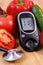 Vegetables, glucometer and stethoscope on wooden surface, healthy lifestyle, nutrition, diabetes