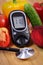 Vegetables, glucometer and stethoscope on wooden surface, healthy lifestyle, nutrition, diabetes