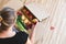 Vegetables grocery box, woman holding a apple