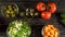 Vegetables ingridients for salad on rustic wooden background.