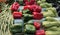 Vegetables in market display gondola: green beans, peppers and eggplants