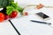 Vegetables, measuring tape, cell phone, diet plan