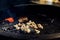 Vegetables and meat grilling. beefsteak mushrooms tomatos garl