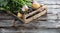 Vegetables with roots in wooden crate for genuine sustainable agriculture