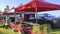 Vegetables on sale at the outdoor local farmers market with tent