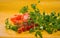 Vegetables - sliced tomato, cherry tomatoes on a branch, parsley