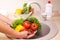 Vegetables washing in a kitchen.