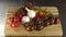 Vegetables on wooden board.Cherry tomatoes, onion, garlic, red pepper