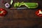 Vegetables wooden table top view Pepper red onion celery background