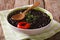 Vegetarian black bean soup close up in a bowl. horizontal