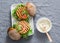 Vegetarian burgers - chickpea and cauliflower burgers on a gray background, top view