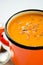 Vegetarian carrot-pumpkin cream soup with flax seeds