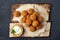 Vegetarian chickpeas falafel balls on wooden rustic board