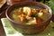 Vegetarian cuisine - soup with potatoes and chanterelles forest mushroom