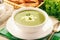 Vegetarian cuisine - spinach cream-soup with feta cheese.