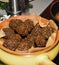 Vegetarian dish - falafel balls from spiced chickpeas on wooden rustic table