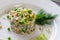 Vegetarian dish: russian salad made from cucumbers, carrots, avo