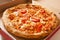 Vegetarian fast food. Margaretha or margarita margherita pizza texture in pizza box. Pizza without meat. Tasty delicious