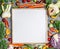 Vegetarian food, health and diet nutrition background with variety of fresh farm vegetables around a blank white chalkboard, top