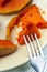 Vegetarian food: pumpkin piece on fork