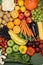 Vegetarian fruits and vegetables like apple, orange background