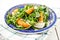 Vegetarian gourmet salad with arugula and peaches