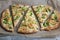 Vegetarian homemade italian pizza with broccoli and cheese on wooden background. Healthy food. .