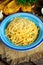 Vegetarian Italian Pasta Spaghetti Aglio E Olio with garlic bread, red chili flake, parsley, parmesan cheese and glas of water