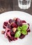 Vegetarian lean lettuce from beet, onion, walnuts, serving on a