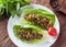 Vegetarian lettuce wraps with mushrooms, chestnuts, onion