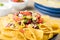 Vegetarian nachos with salsa and sour cream dips