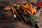 Vegetarian Oven baked sweet potato fries. Dark wooden background. Top view. Copy space