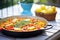 vegetarian paella with bell peppers and chickpeas, bright colors