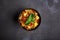 Vegetarian paneer biryani at black background